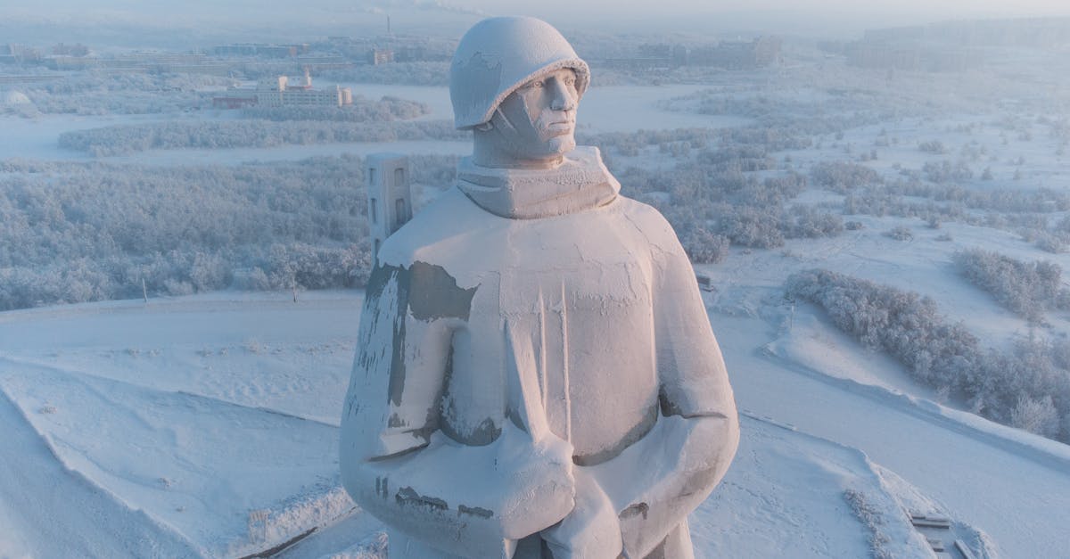 Aerial view of the Alyosha statue in Murmansk, Russia, covered in winter snow.
