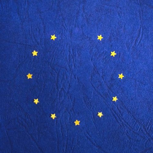 European Union flag with missing stars representing Brexit concept.