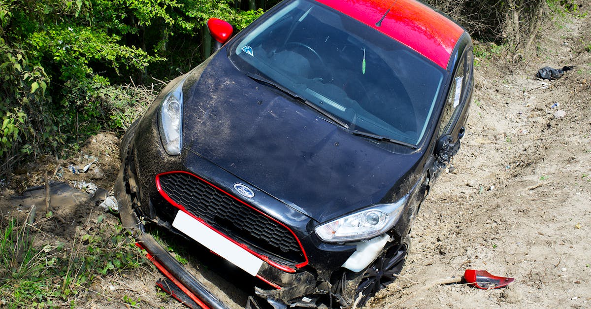 Damaged car after an accident on a dirt road in Welwyn Garden City, UK.