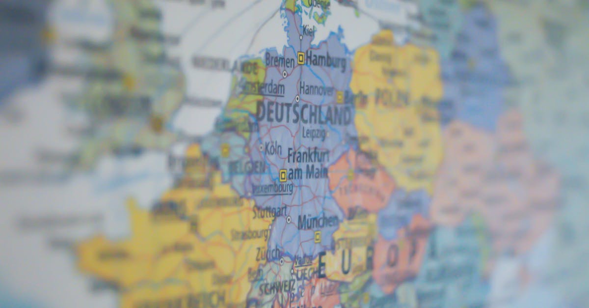Close-up view of Germany on a colorful world map showing major cities.