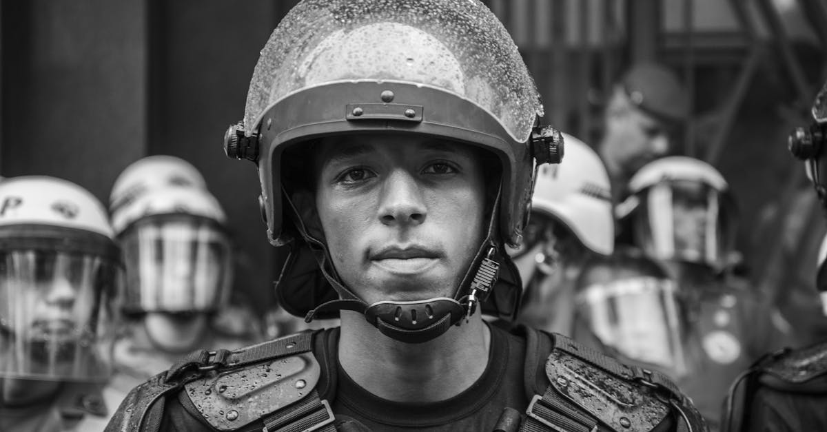 Close-up grayscale portrait of a riot police officer in Sao Paulo, Brazil.
