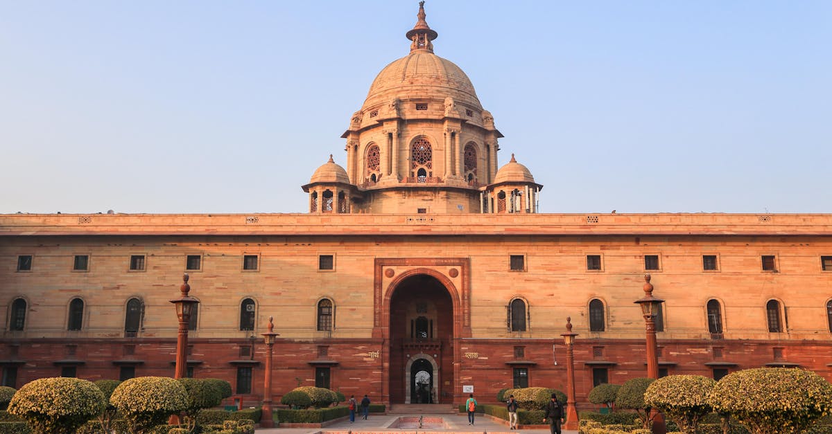Explore the iconic Rashtrapati Bhavan with its historical architecture in sunny Delhi.