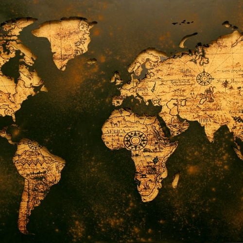 A detailed vintage map showcasing global geography with an old paper texture.