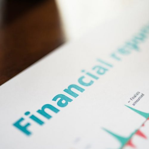 Detailed view of a financial report with a focus on graphs and data analysis.
