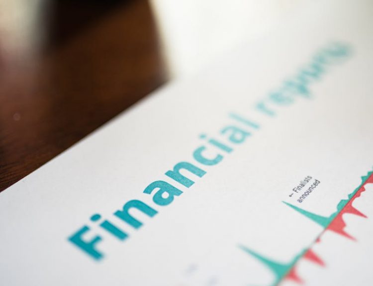 Detailed view of a financial report with a focus on graphs and data analysis.