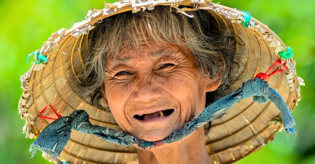 A vibrant portrait of a smiling elderly woman in a conical hat against a green background.